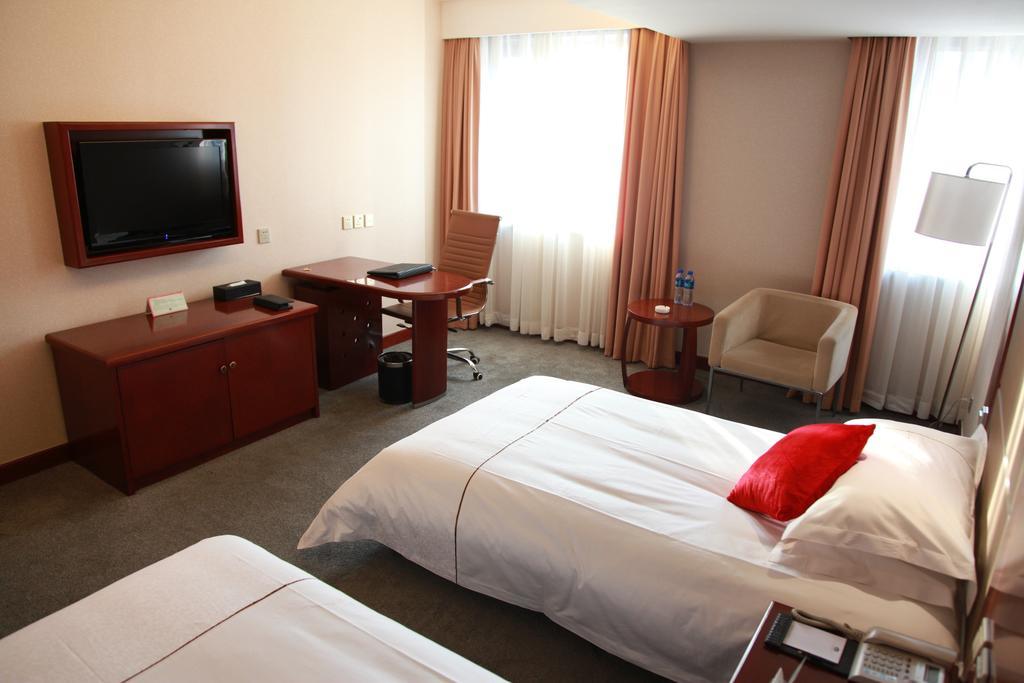 New Gloria Plaza Garden Hotel Harbin Zimmer foto