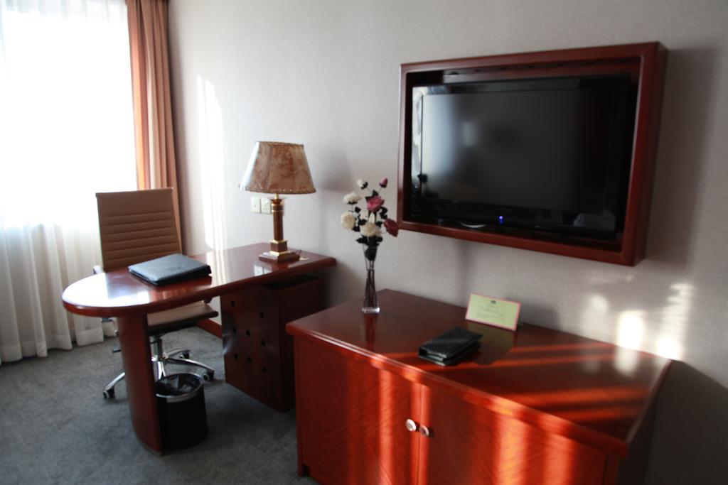 New Gloria Plaza Garden Hotel Harbin Zimmer foto