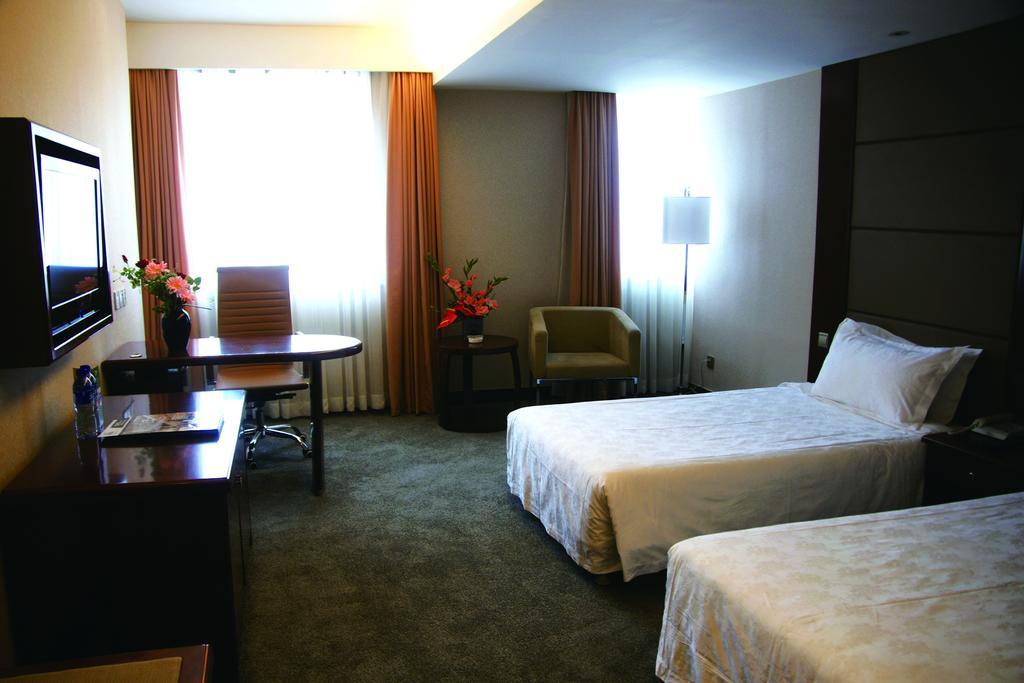 New Gloria Plaza Garden Hotel Harbin Zimmer foto