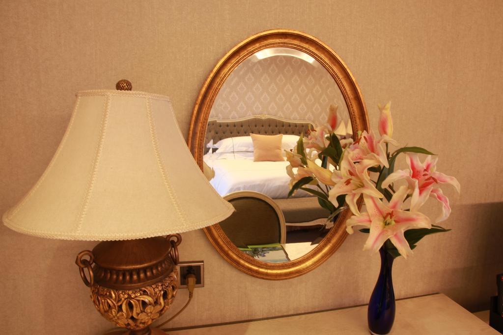 New Gloria Plaza Garden Hotel Harbin Zimmer foto