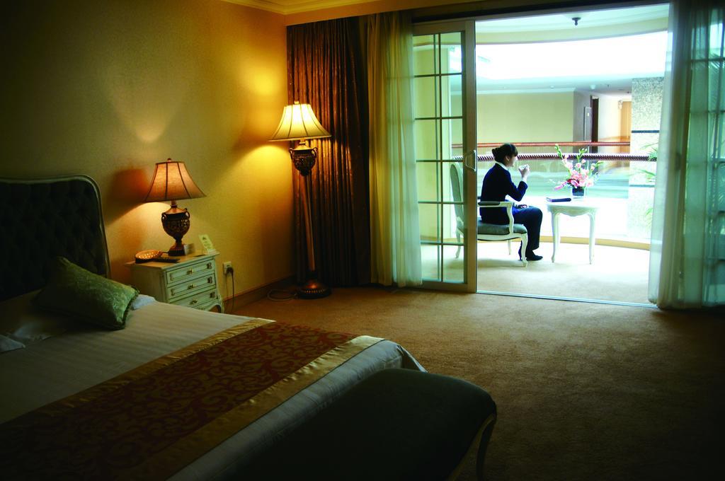 New Gloria Plaza Garden Hotel Harbin Zimmer foto