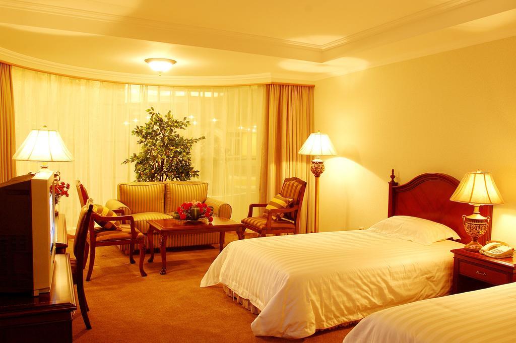 New Gloria Plaza Garden Hotel Harbin Zimmer foto