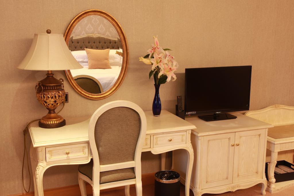 New Gloria Plaza Garden Hotel Harbin Zimmer foto