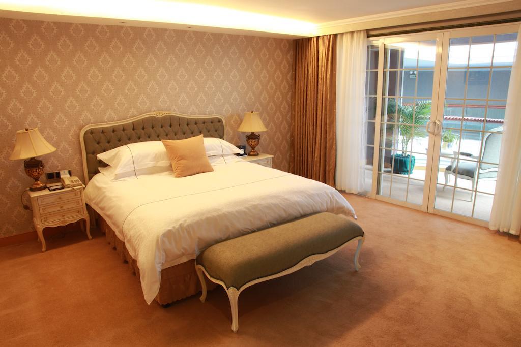 New Gloria Plaza Garden Hotel Harbin Zimmer foto