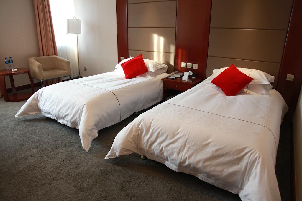 New Gloria Plaza Garden Hotel Harbin Zimmer foto