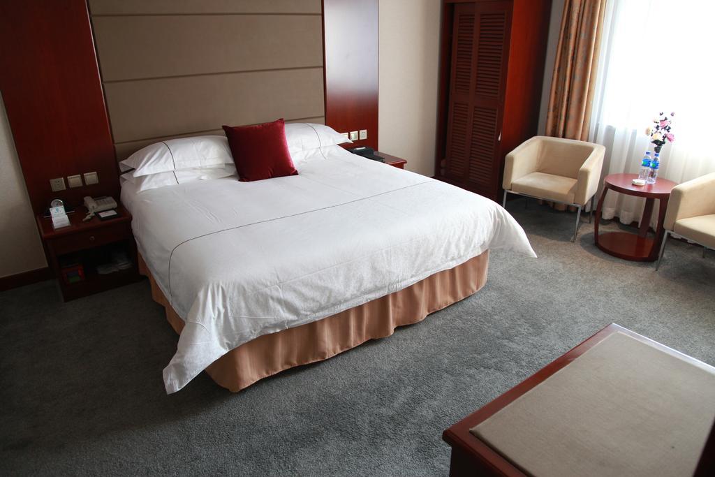 New Gloria Plaza Garden Hotel Harbin Zimmer foto
